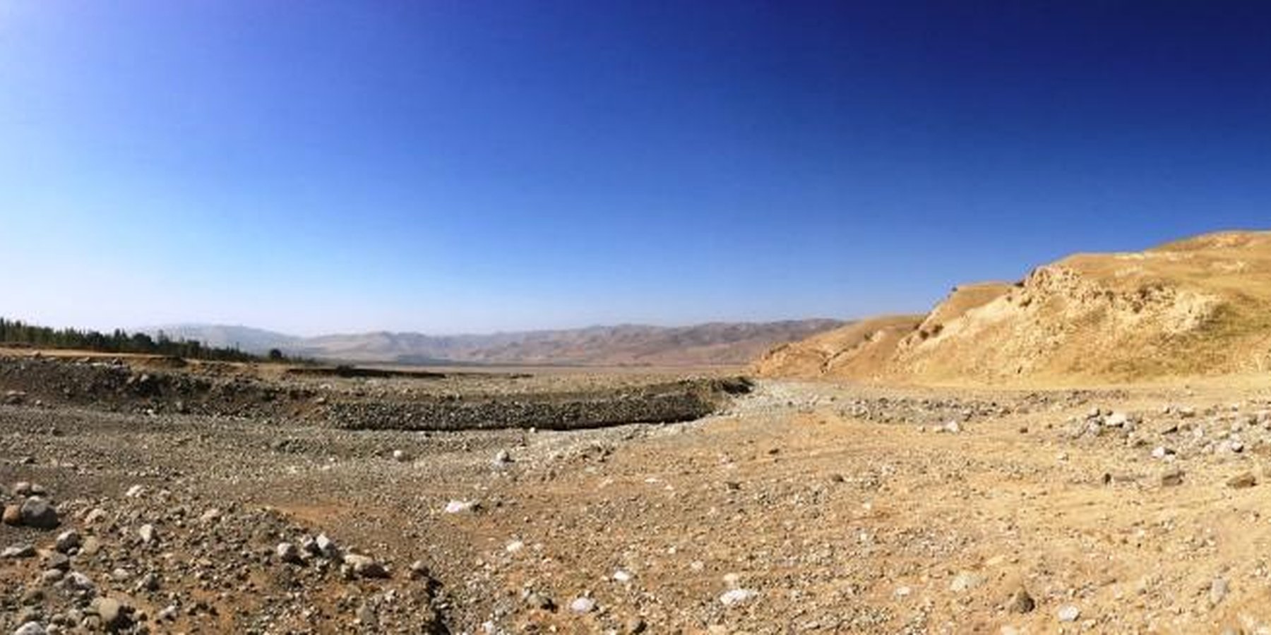 River training dam with gabion reinforcement built in Obishur watershed, Southern Tajikistan