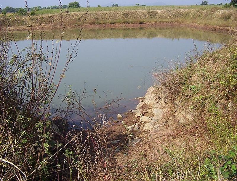 Dugout sunken pond showing inlet system